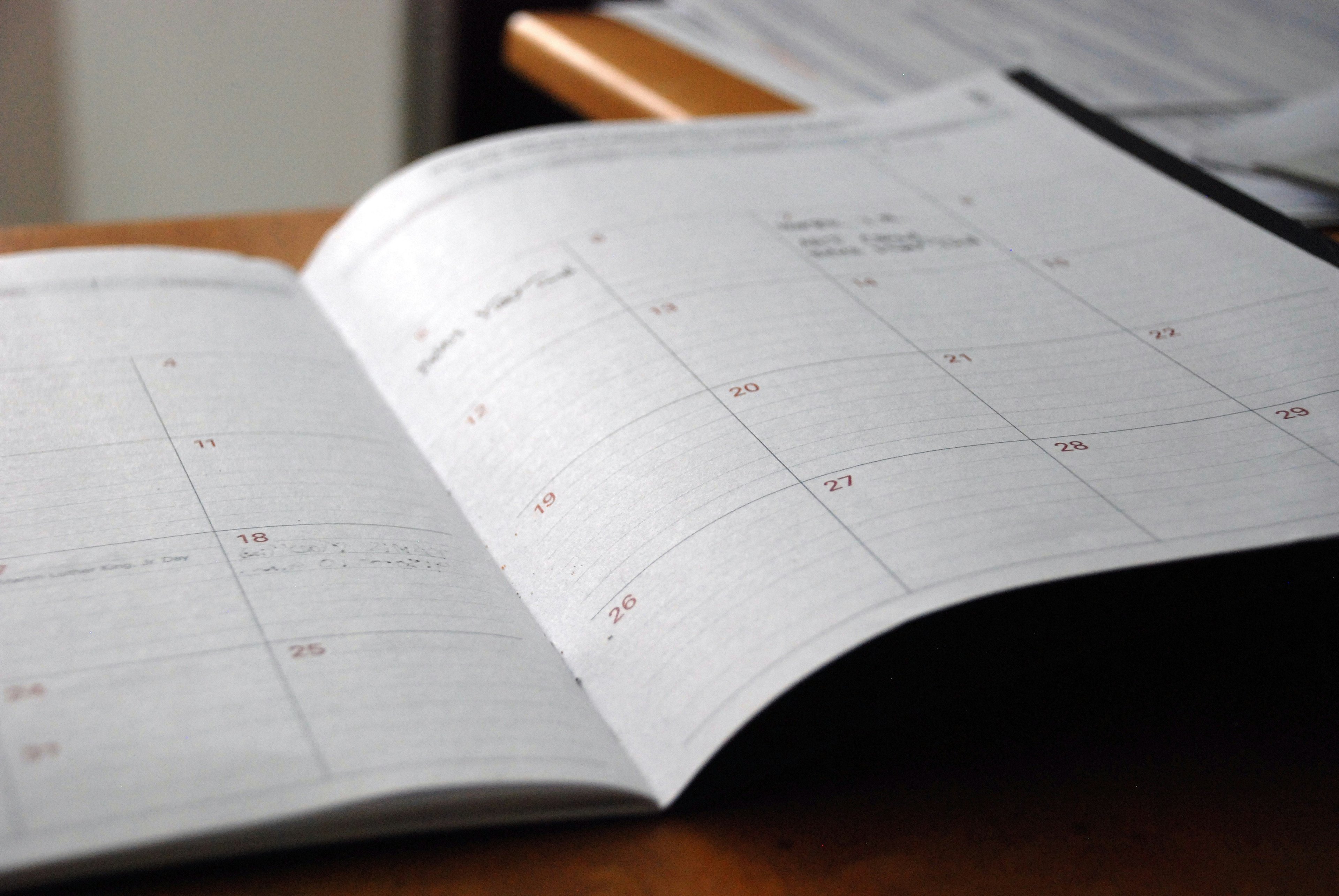 An open planner showing days of the month.